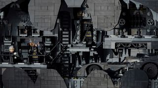 A view of the Lego Batman Returns Batcave through the bat symbol