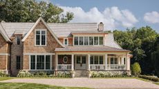 Exterior of a shingle home with front porch