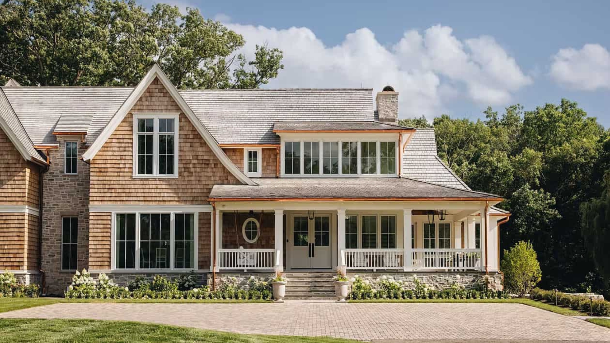 Exterior of a shingle home with front porch