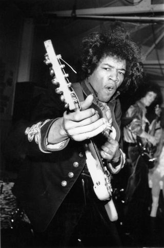 Jimi Hendrix performing live onstage