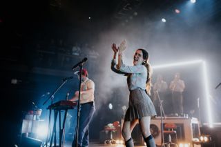 siblings clyde and gracie lawrence performing on tour with their band lawrence