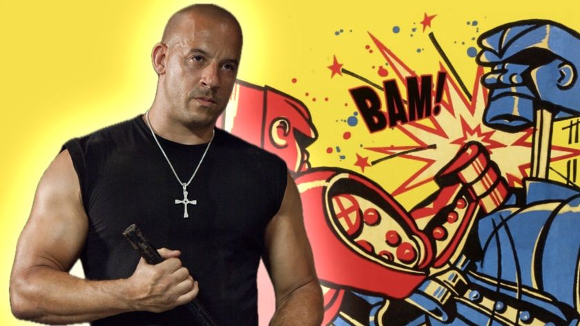 Vin Diesel alongside the box art for Rock&#039;em Sock&#039;em Robots