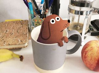 John Bond's dog illustration in a tea cup