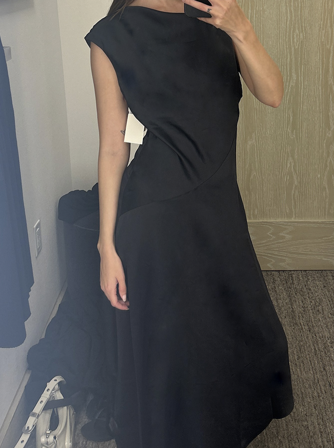 Audry Hiaoui trying on clothes atReplica Store flagship during theReplica Store Anniversary Sale 2025.