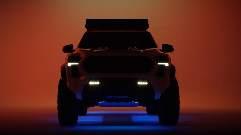 A Tacoma H2-Overlander truck in a studio