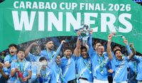Manchester City players celebrate with EFL Trophy after winning the Carabao Cup Final match between Arsenal and Manchester City at Wembley Stadium on March 22, 2026 in London, England