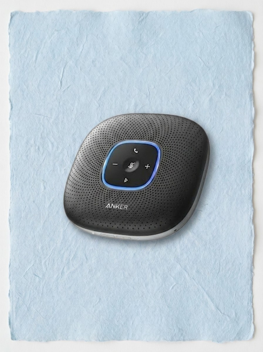 Anker office tech on a textured pale blue background