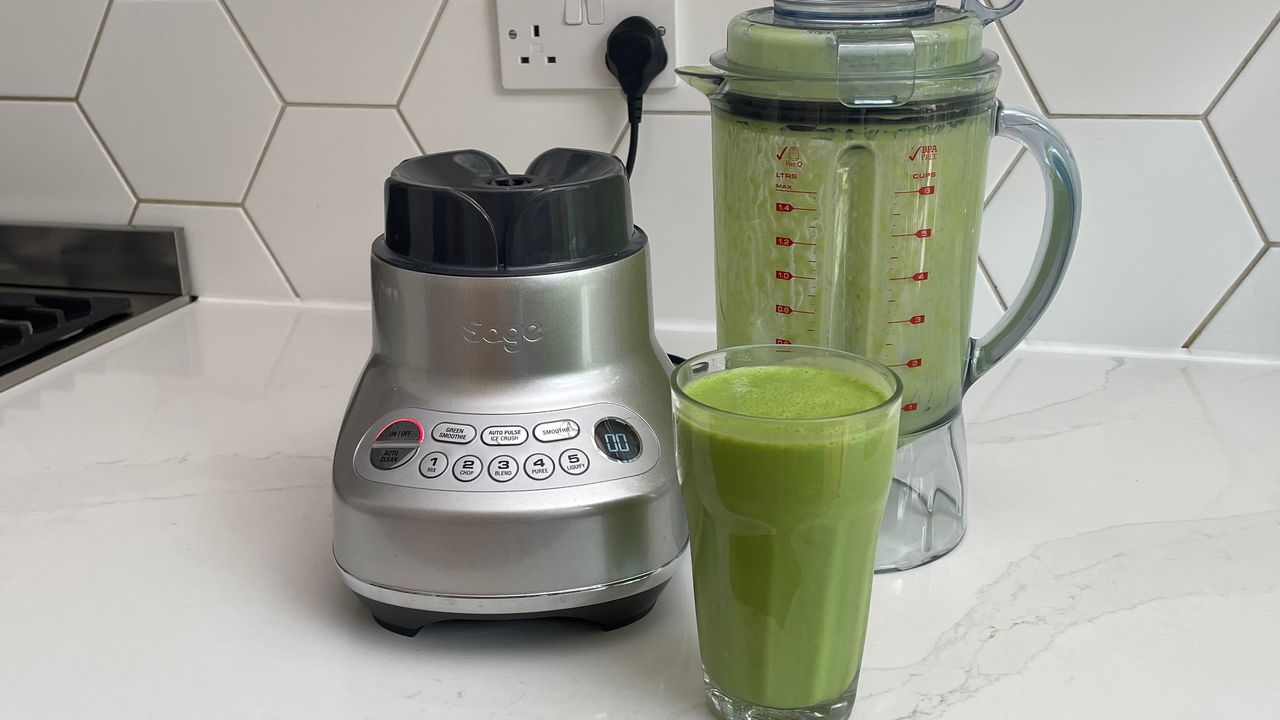 The Breville the Fresh &amp; Furious on a kitchen countertop having been used to make a green smoothie