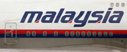 Body from Malaysia Airlines Flight 17 found wearing an oxygen mask