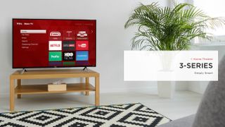 32-inch TCL 3-Series Roku TV on wooden counter