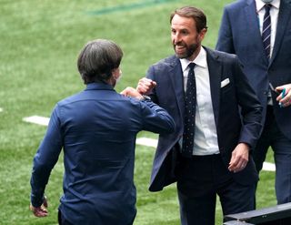 Southgate, right, also applauded the career of Germany manager Joachim Low
