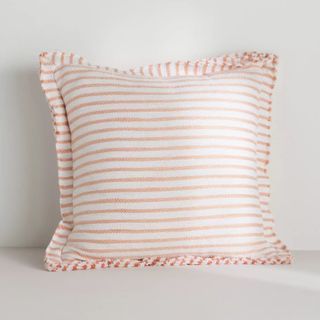 pink and white striped cushion