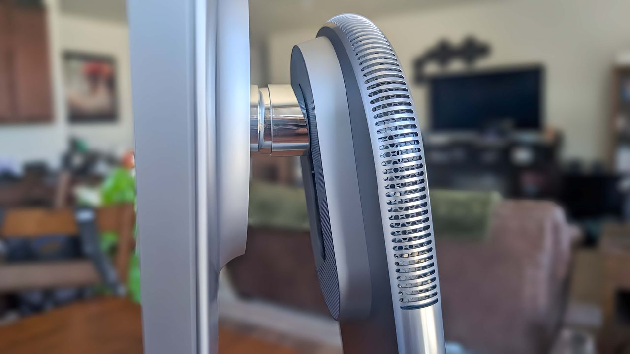 Closeup of the Lenovo Yoga AIO 27" stand to show that the display can go up and down or be tilted.