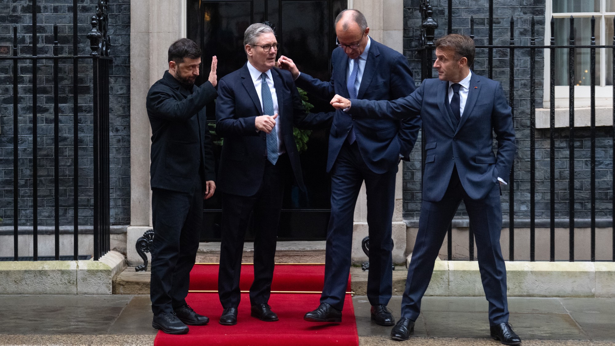 British Prime Minister Keir Starmer bids farewell as Ukrainian President Volodymyr Zelensky, German Chancellor Friedrich Merz and French President Emmanuel Macron depart