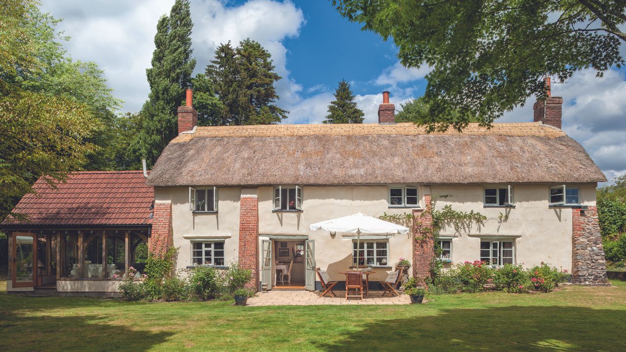 thatched home in summer