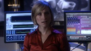Chloe Sullivan (Allison Mack) speaks to Oliver Queen on Smallville.
