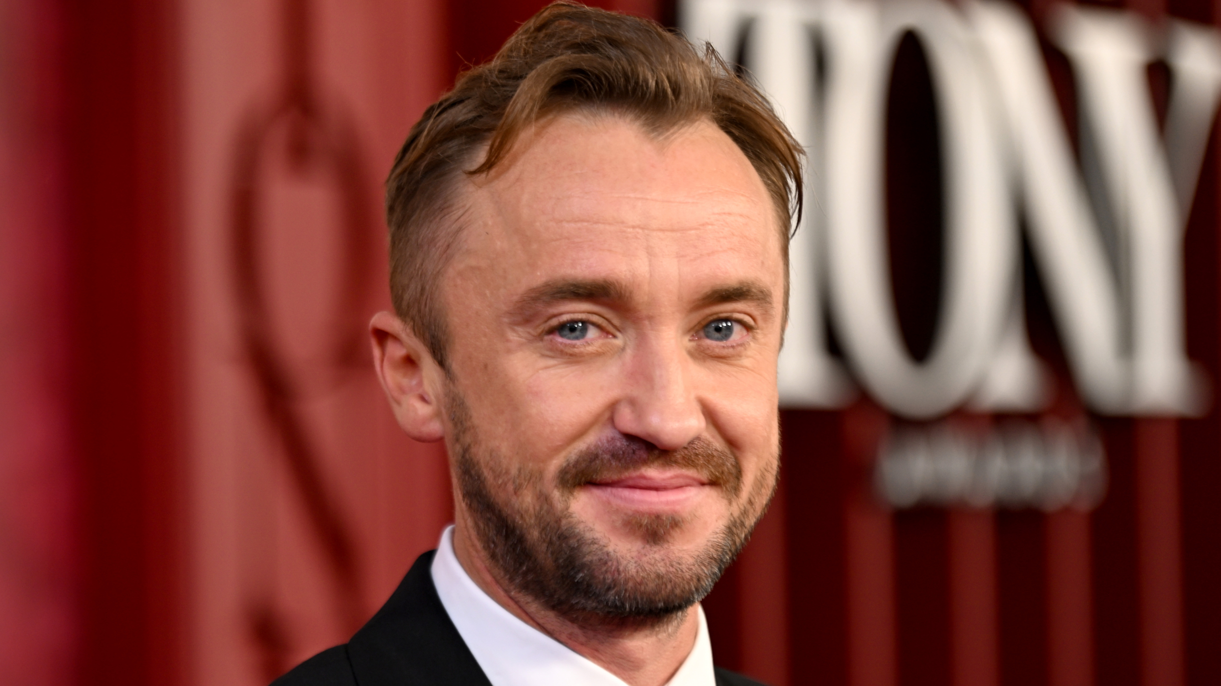 Tom Felton at an awards ceremony