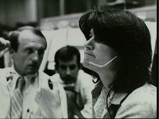 Astronaut Sally Ride at the CapCom console during STS-2 simulation.