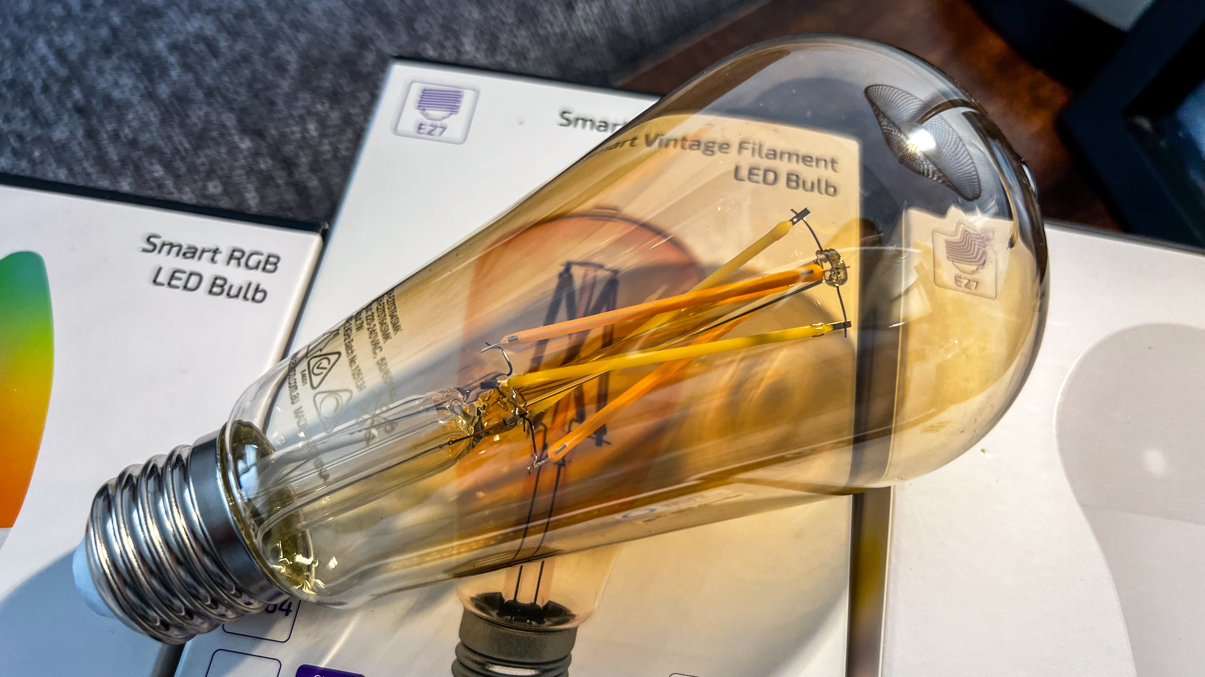 Laser filament smart bulb in the amber globe
