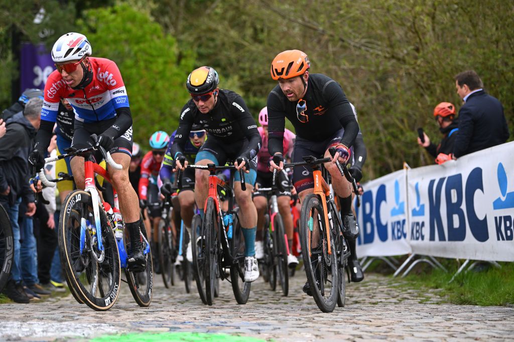 OVERIJSE BELGIUM APRIL 12 LR Pascal Eenkhoorn of The Netherlands and Team Lotto Dstny and Colin Joyce of The United States and Team Human Powered Health compete during the 63rd De Brabantse Pijl La Fleche Brabanconne 2023 Mens Elite a 2051km one day race from Leuven to Overijse on April 12 2023 in Overijse Belgium Photo by Luc ClaessenGetty Images