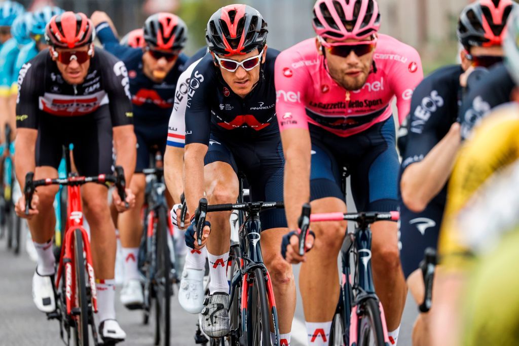 Overall leader Team Ineos rider Italys Filippo Ganna wearing the pink jersey CR and Team Ineos rider Great Britains Geraint Thomas chase an eightmen breakaway on October 5 2020 during the 3rd stage of the Giro dItalia 2020 cycling race a 150kilometer route between Enna and volcano Etna LinguaglossaPiano Provenzana Sicily Photo by Luca Bettini AFP Photo by LUCA BETTINIAFP via Getty Images