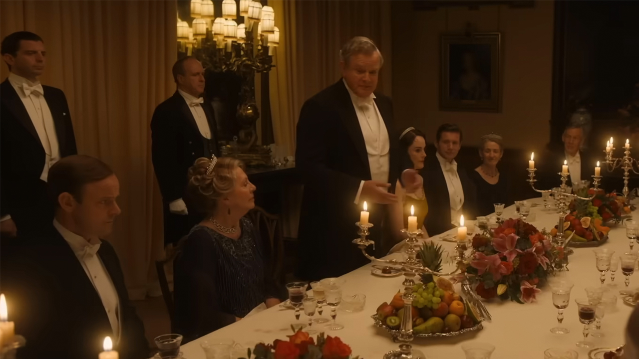 Hugh Bonneville in Downton Abbey: The Grand Finale addressing his dinner guests.