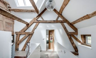Landing with exposed oak frame in renovation