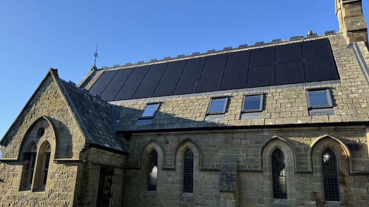 A church conversion with solar panels on the roof