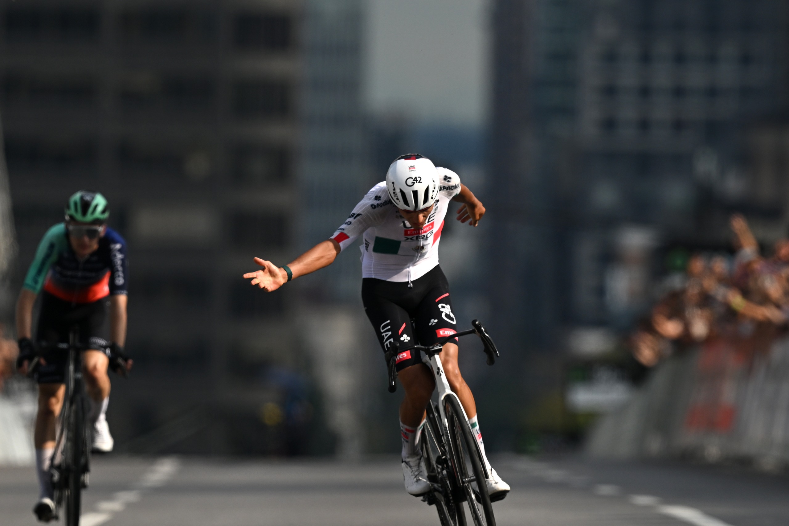 Isaac Del Toro of Mexico and UAE Team Emirates - XRG (R) celebrates at finish line as stage winner ahead of Paul Seixas of France and Team Decathlon CMA CGM Team (L) during the 15th Grand Prix Cycliste de Montreal 2026 a 214.4km one day race from Montreal to Montreal / #UCIWT / on September 13, 2026 in Montreal, Quebec. (Photo by Dario Belingheri/Getty Images)