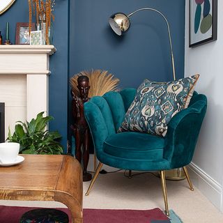 blue living room with armchair