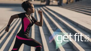 Woman running up stairs wearing headphones