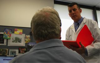 The author, Dr. Heath Jolliff of Nationwide Children’s Hospital, meets with a patient.