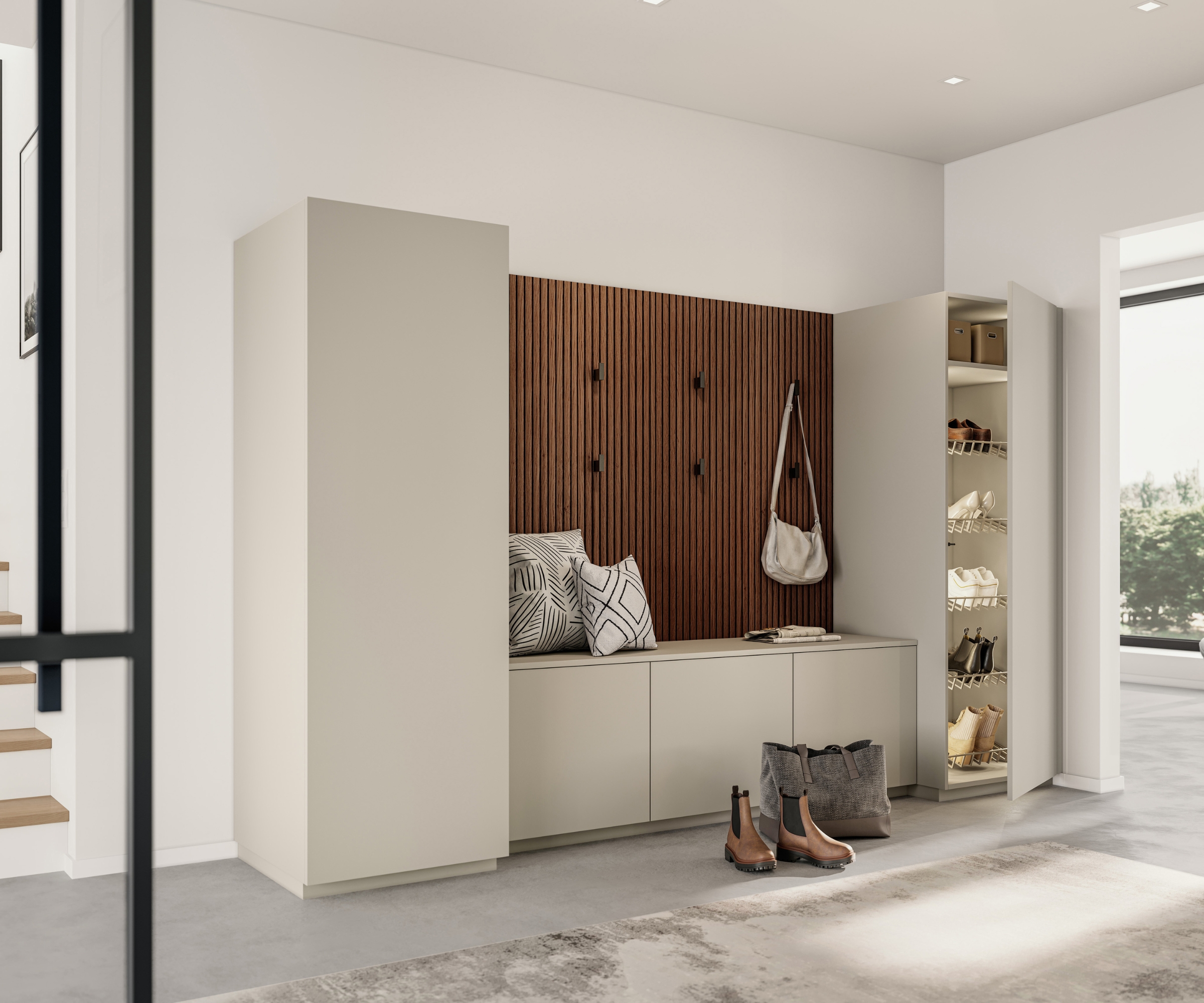 Built-in mudroom bench with wood-slatted wall, cushions, shoe storage cabinet, boots and bag on floor.
