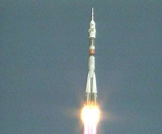 Acrobat Space Tourist Rockets Into Orbit