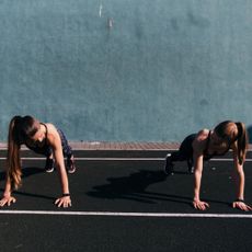 How to get motivated to workout: Two women doing push ups