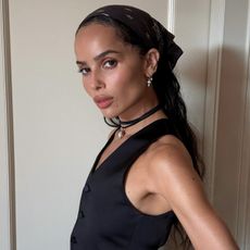 An image of Zoe Kravitz wearing a scarf.