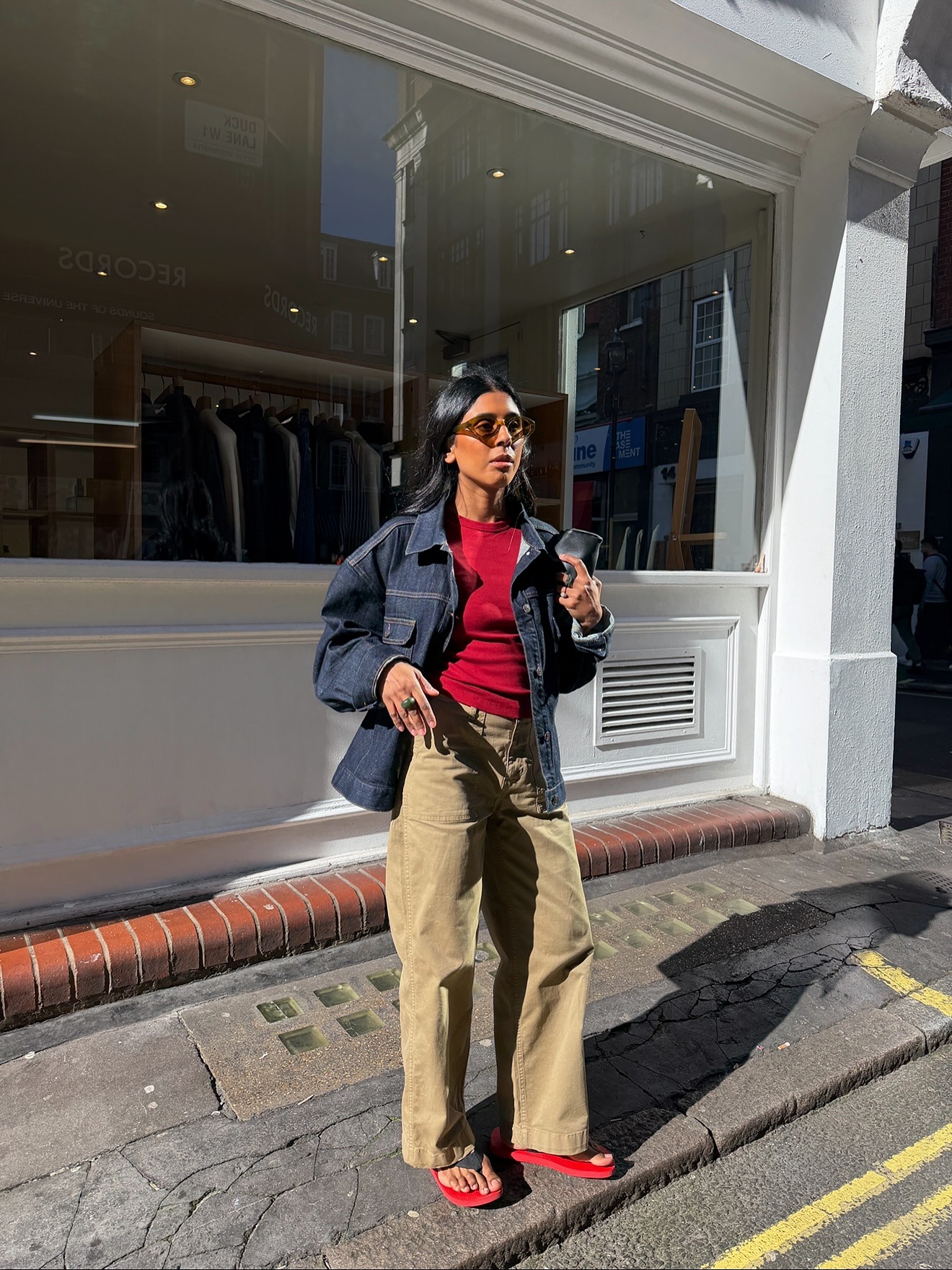 Woman wearing bootcut jeans, a spring 2026 jean trend.