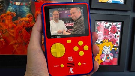 Hand holding Super Pocket Rare Edition with Blaze's Sean Cleaver and Ben Grunbaum on screen.