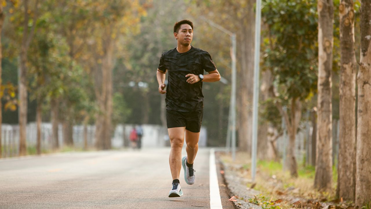 Man jogging down the street