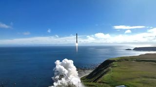 A Rocket Lab Electron rocket launches from a seaside pad in New Zealand on May 8, 2023 local time.