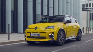 A Renault 5 EV on the road in a city