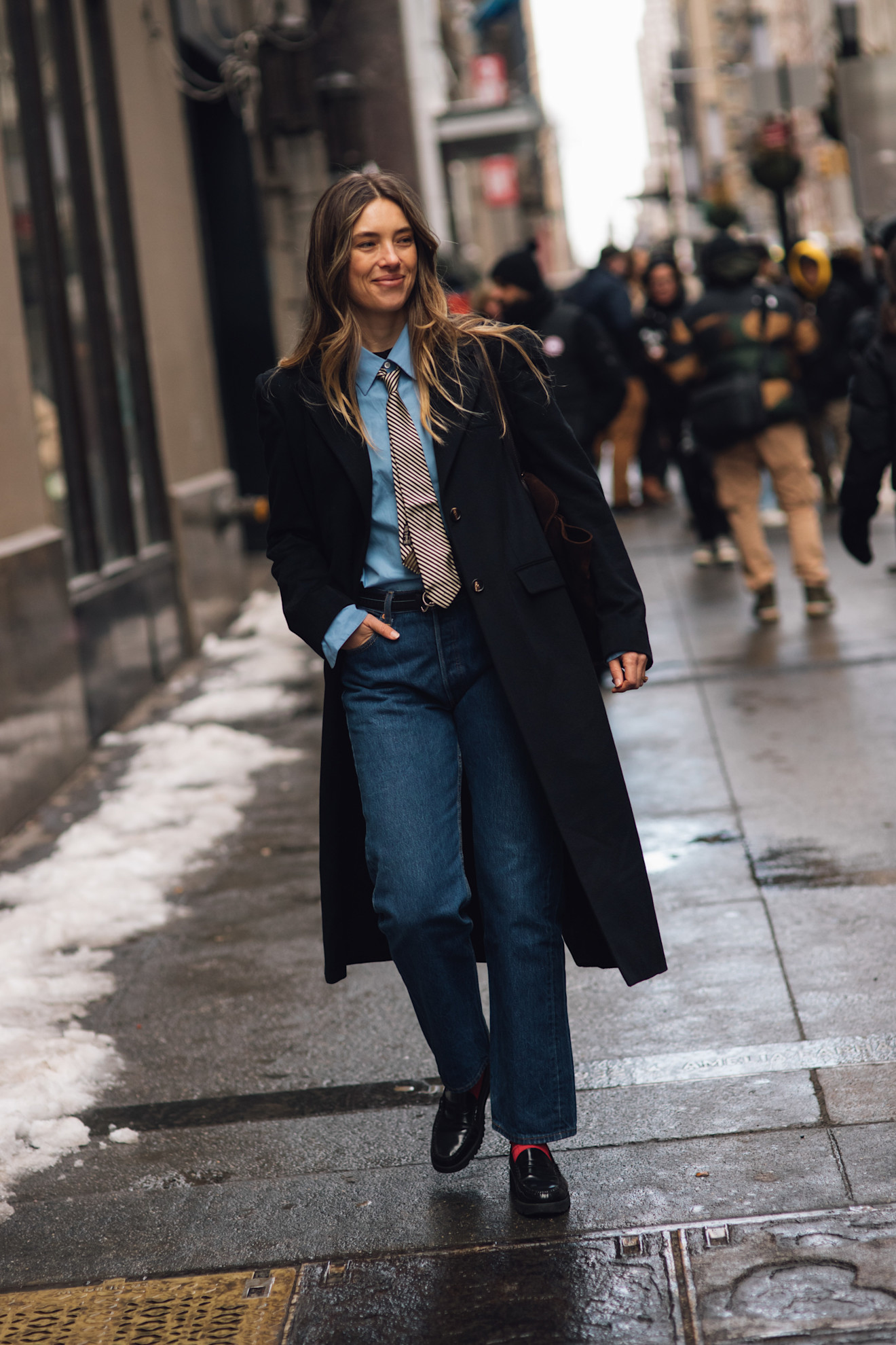 Aemilia Madden wearing necktie, button-down, coat, jeans and loafers