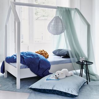 children room with ice blue rug and polar bear toy