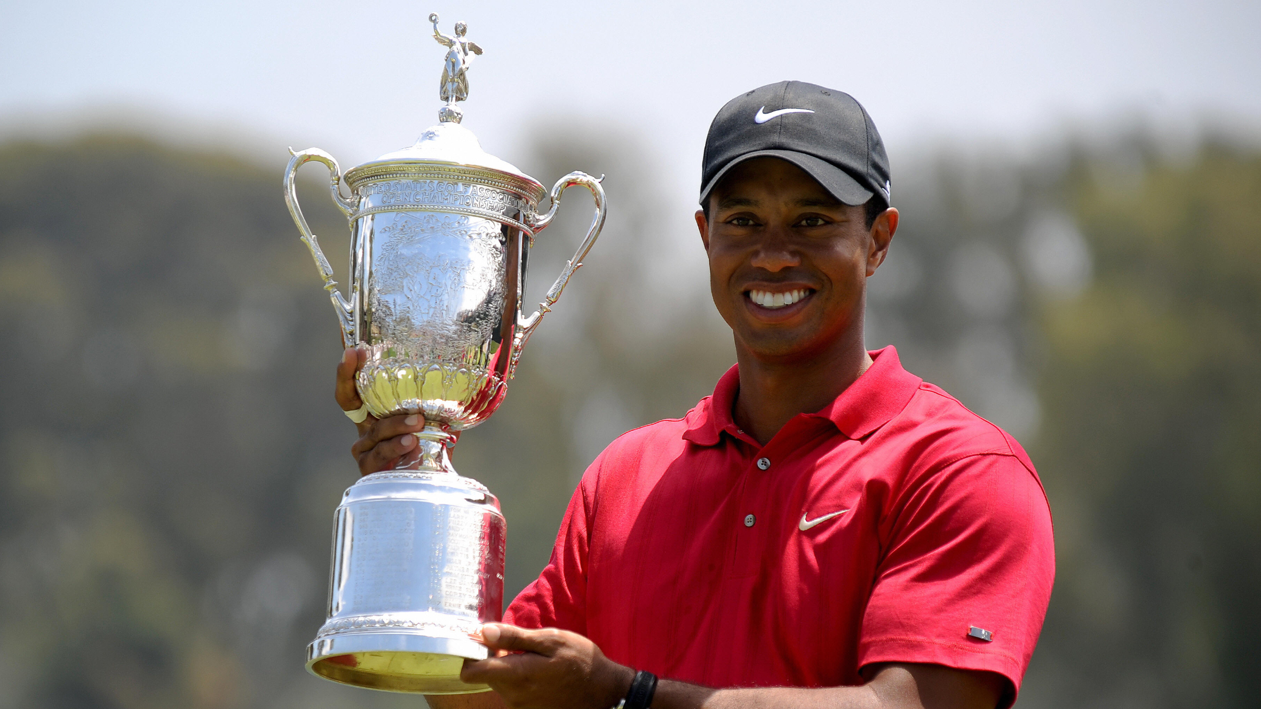 Tiger Woods with the US Open trophy