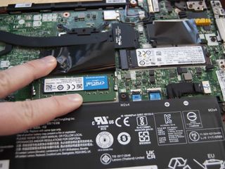 Press down on the RAM until it clicks into place.