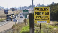 Traffic passes a Vote No On Prop. 50 sign along Highway 41 near Avenue 12 on Oct. 28, 2025, just north of Fresno, California. (Eric Paul Zamora/The Fresno Bee/Tribune News Service via Getty Images)