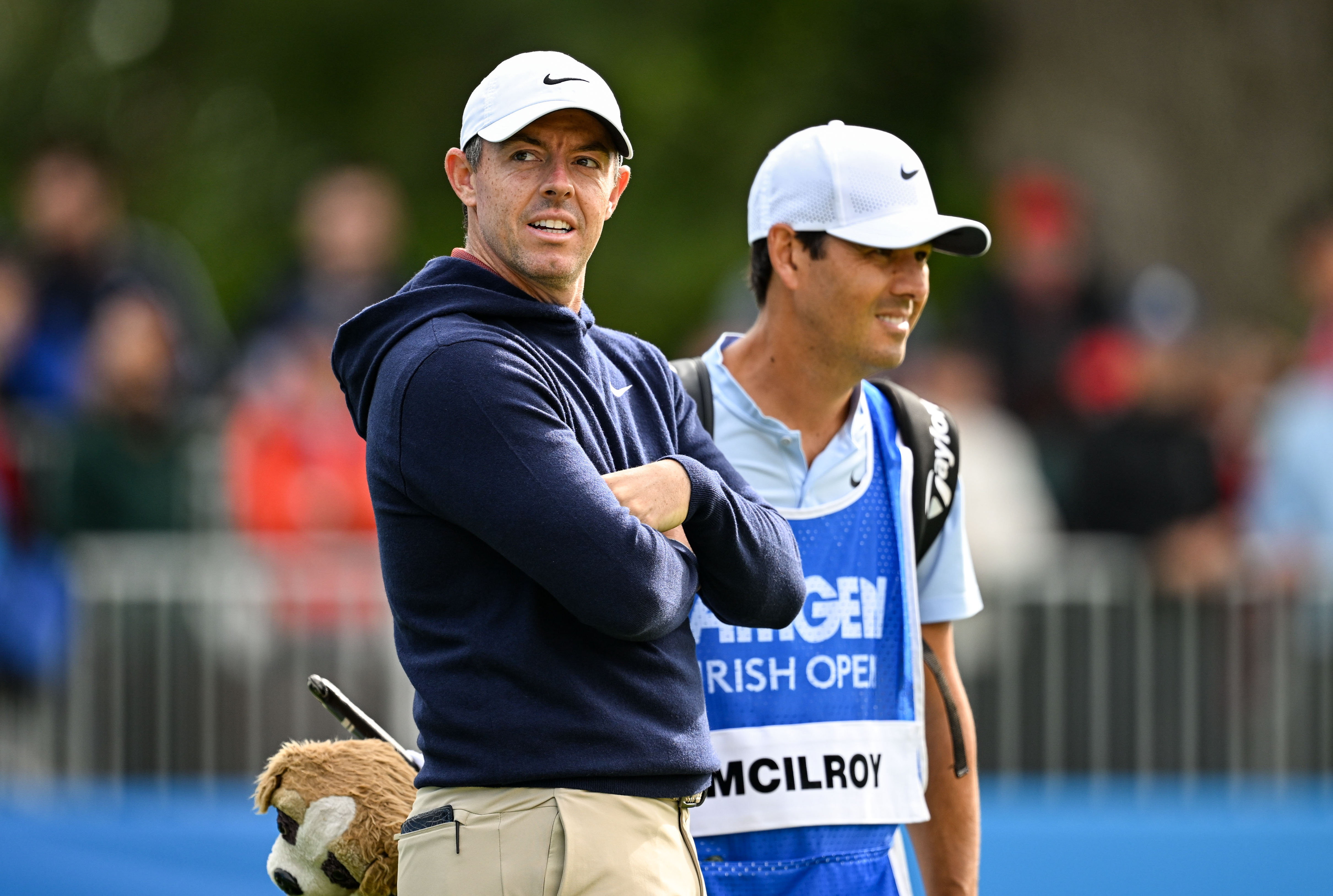 Rory McIlroy stares on with his caddie
