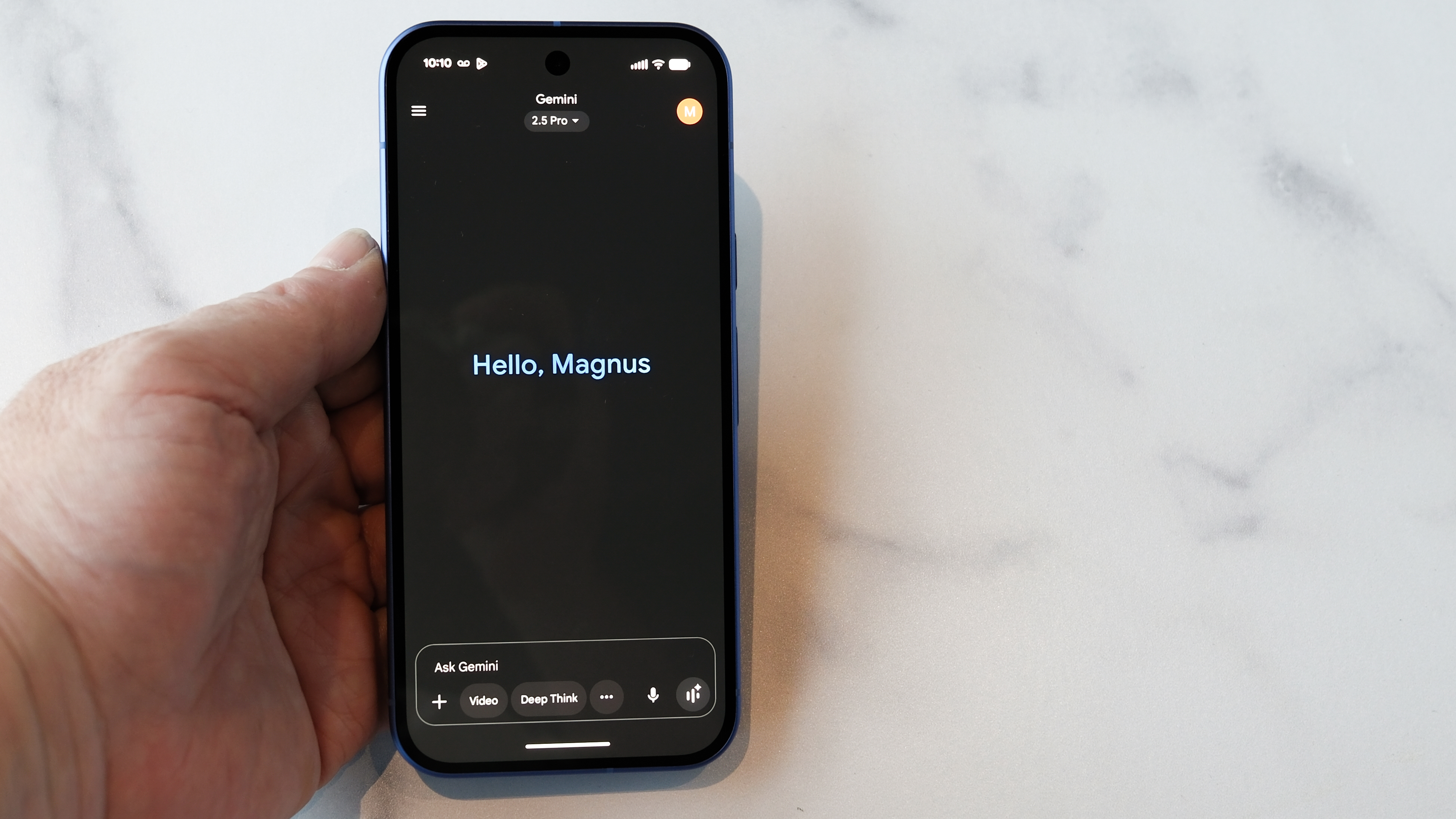Google Pixel 10 showing Gemini Live screen with welcome saying Hello, Magnus