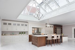 A large roof lantern above a traditional style kitchen