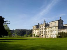 The east front of Wilton House, overlooking the naturalised landscape created by the 9th Earl in the 18th century. Note the Palladian Bridge to the left.